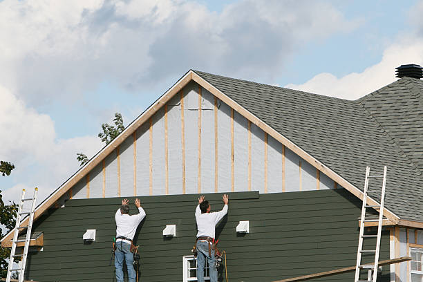 Professional Storm Damage Siding Repair technician working in Forbes Road, PA